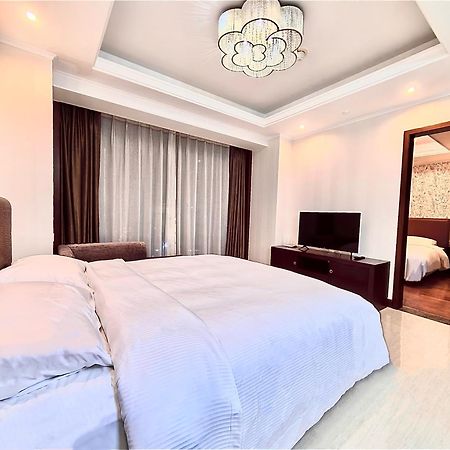 Qingdao Elegant Central Apartment Екстер'єр фото