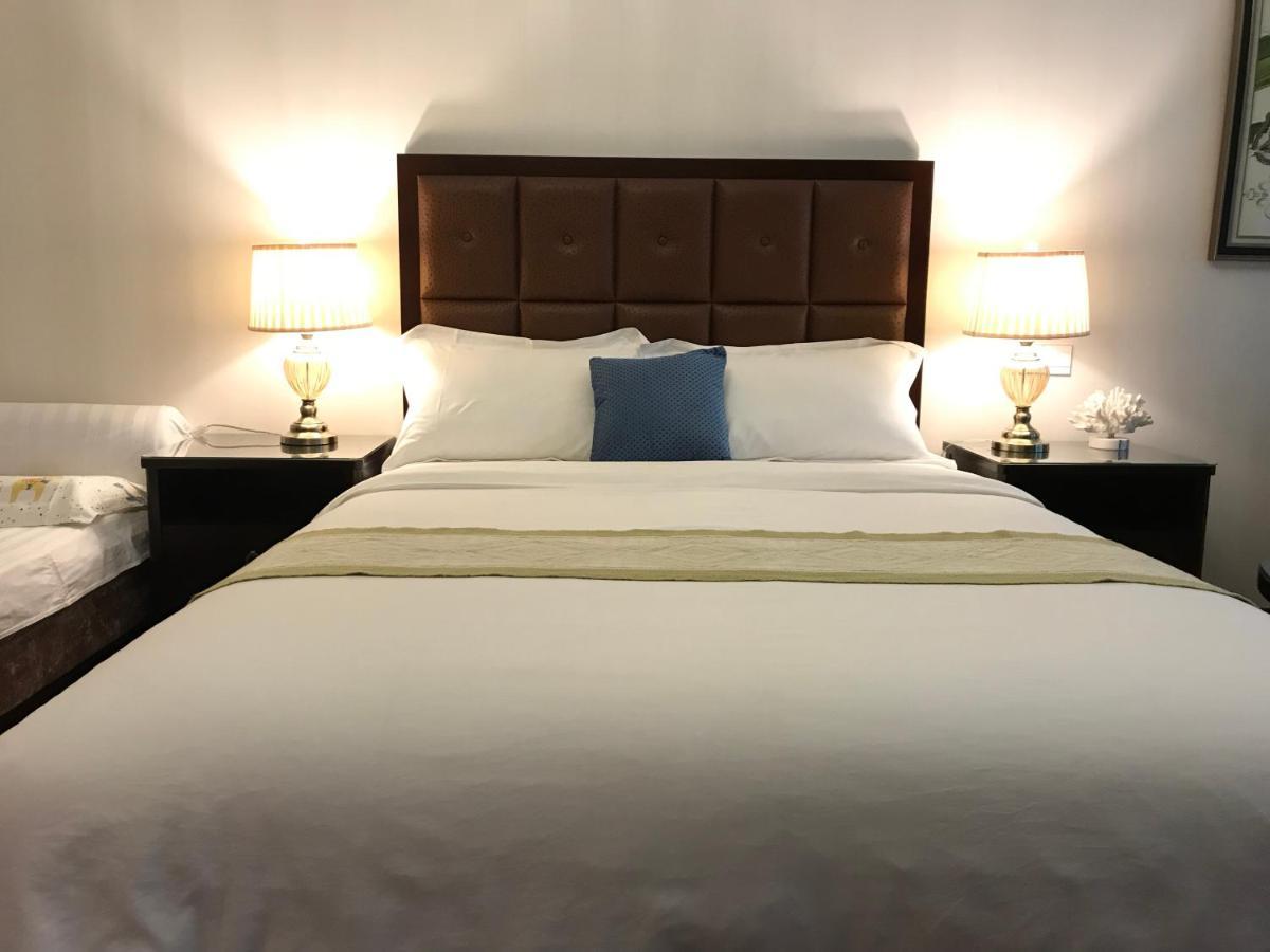 Qingdao Elegant Central Apartment Екстер'єр фото