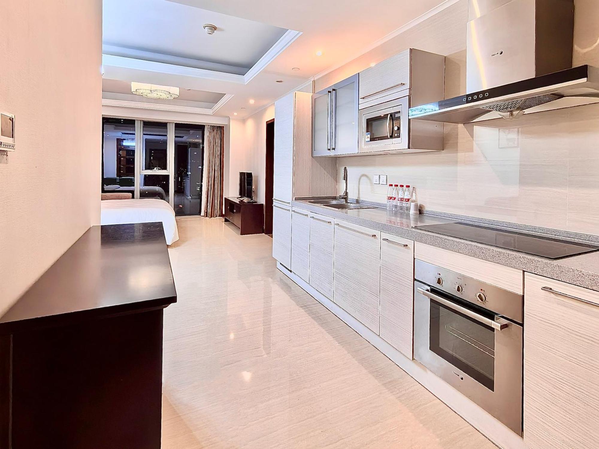 Qingdao Elegant Central Apartment Екстер'єр фото