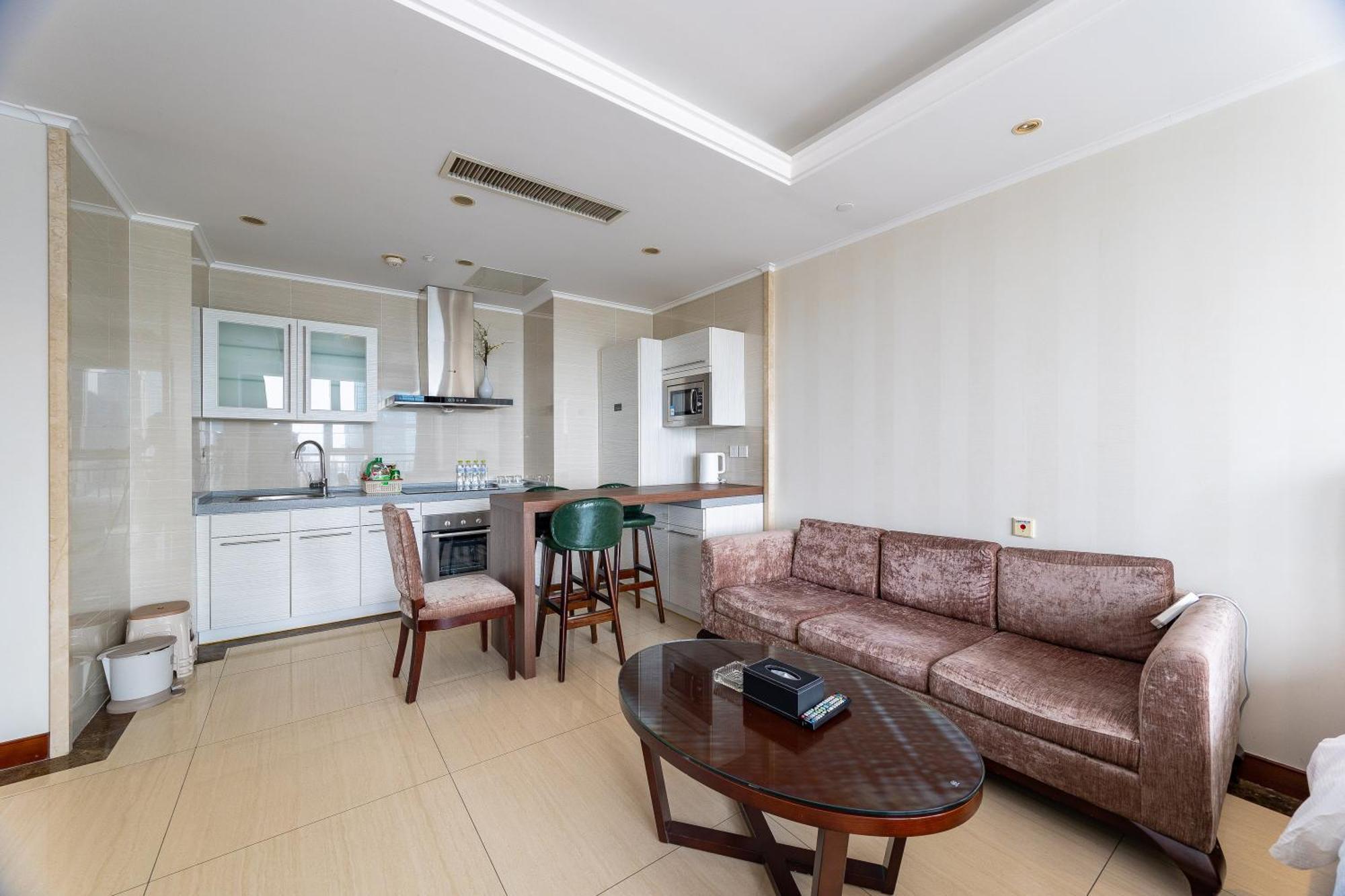 Qingdao Elegant Central Apartment Екстер'єр фото