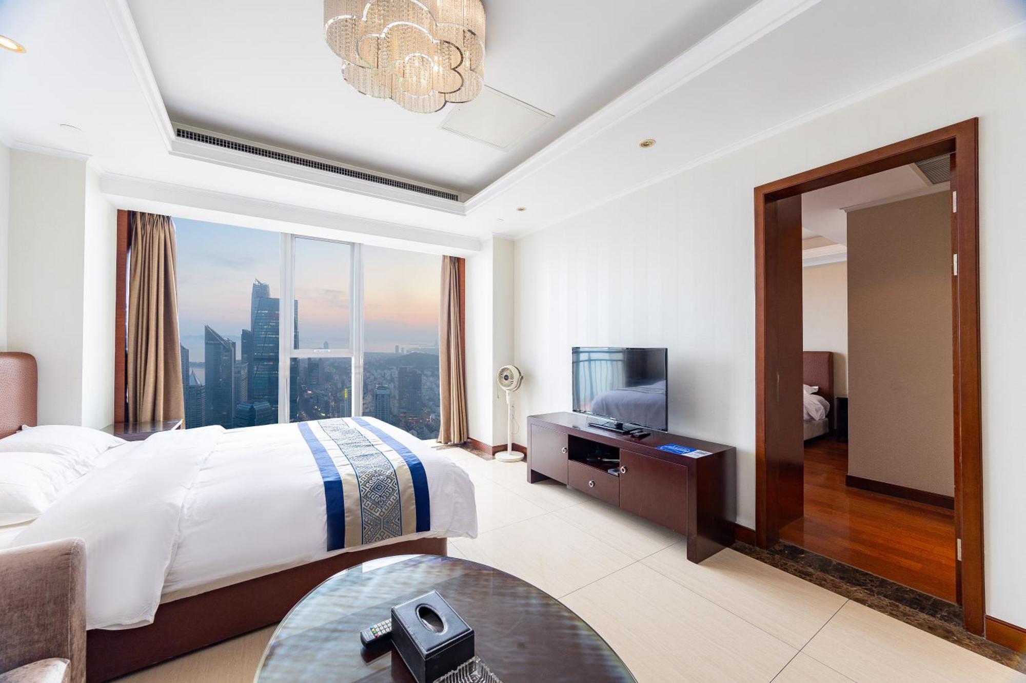 Qingdao Elegant Central Apartment Екстер'єр фото
