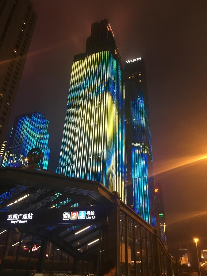 Qingdao Elegant Central Apartment Екстер'єр фото
