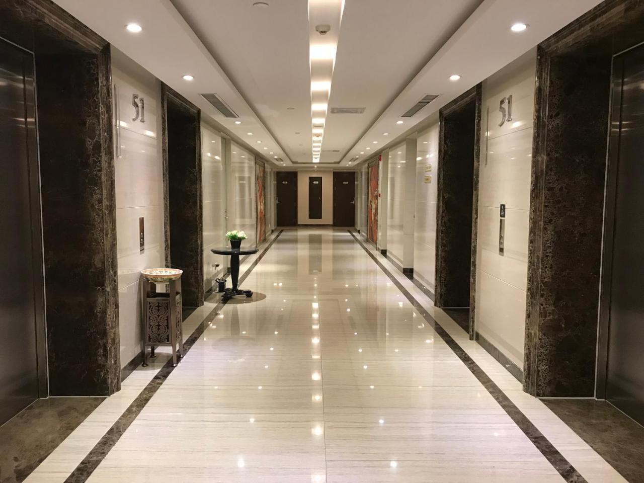 Qingdao Elegant Central Apartment Екстер'єр фото