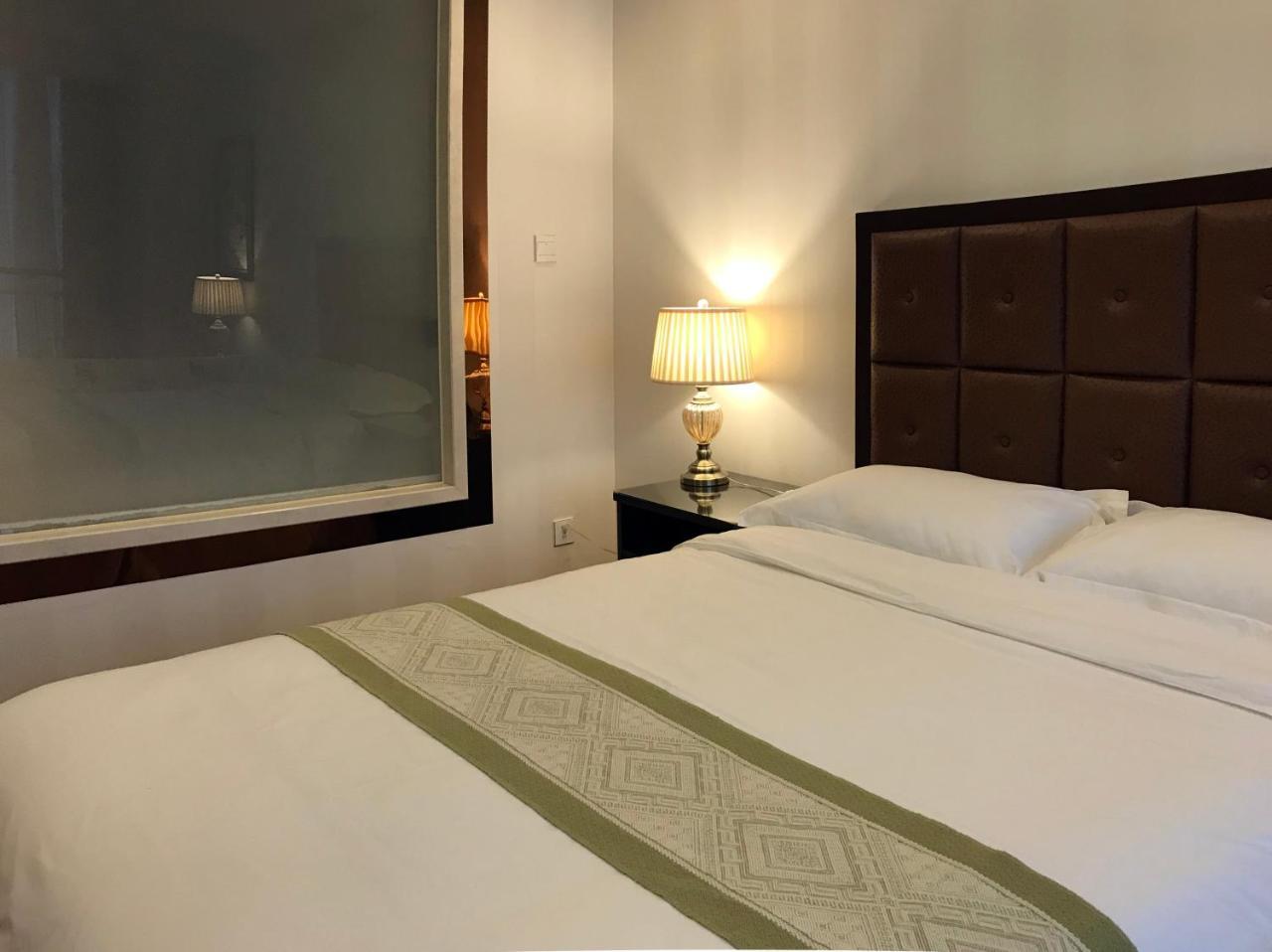 Qingdao Elegant Central Apartment Екстер'єр фото
