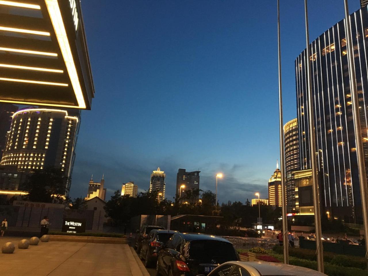 Qingdao Elegant Central Apartment Екстер'єр фото