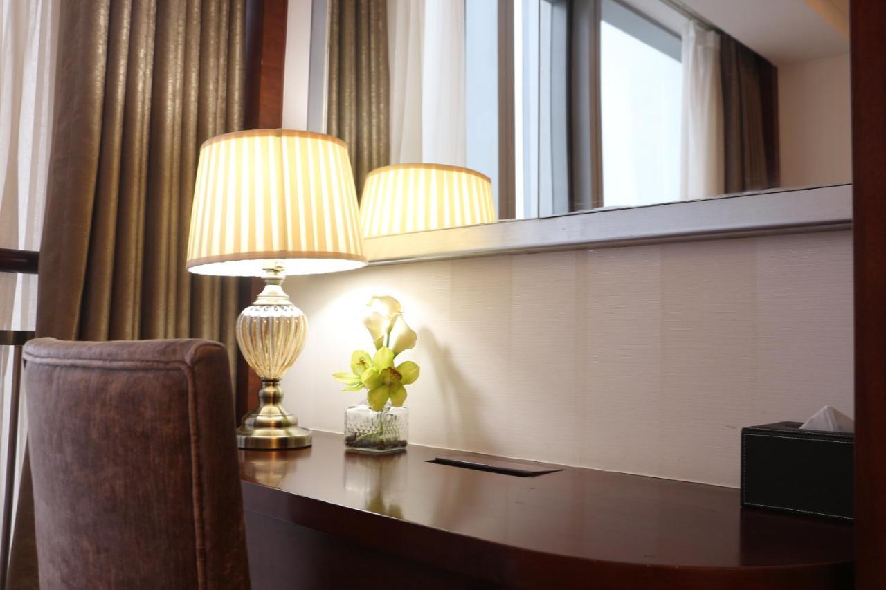 Qingdao Elegant Central Apartment Екстер'єр фото