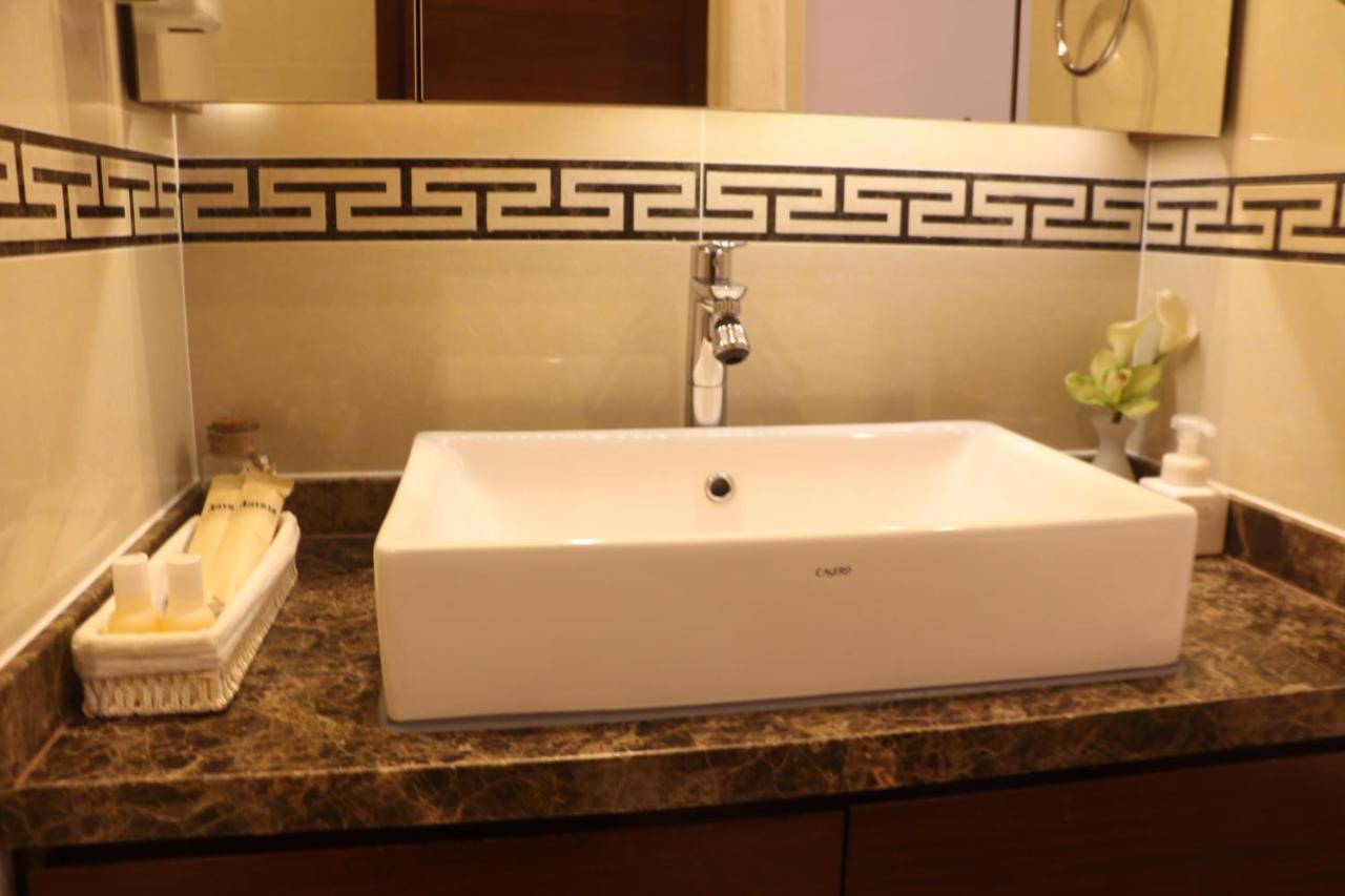Qingdao Elegant Central Apartment Екстер'єр фото