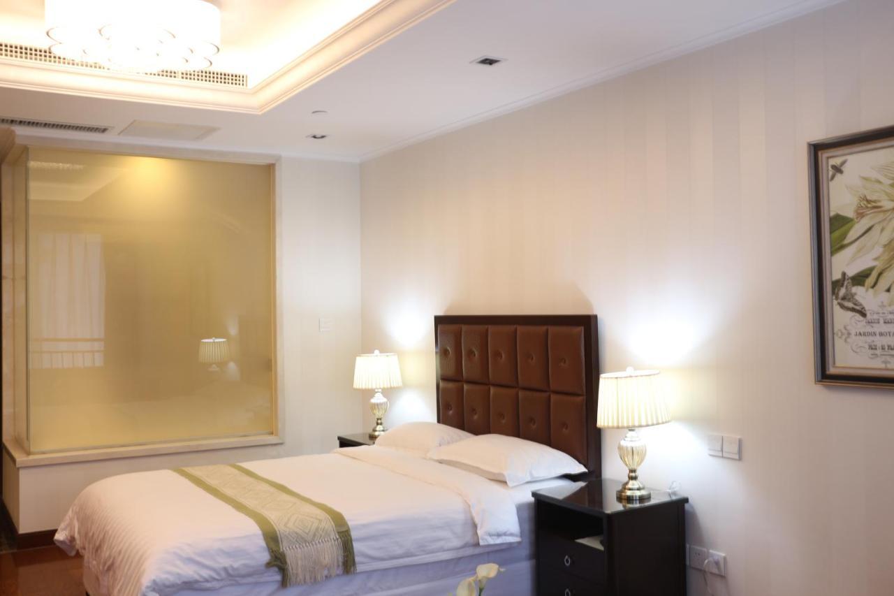 Qingdao Elegant Central Apartment Екстер'єр фото