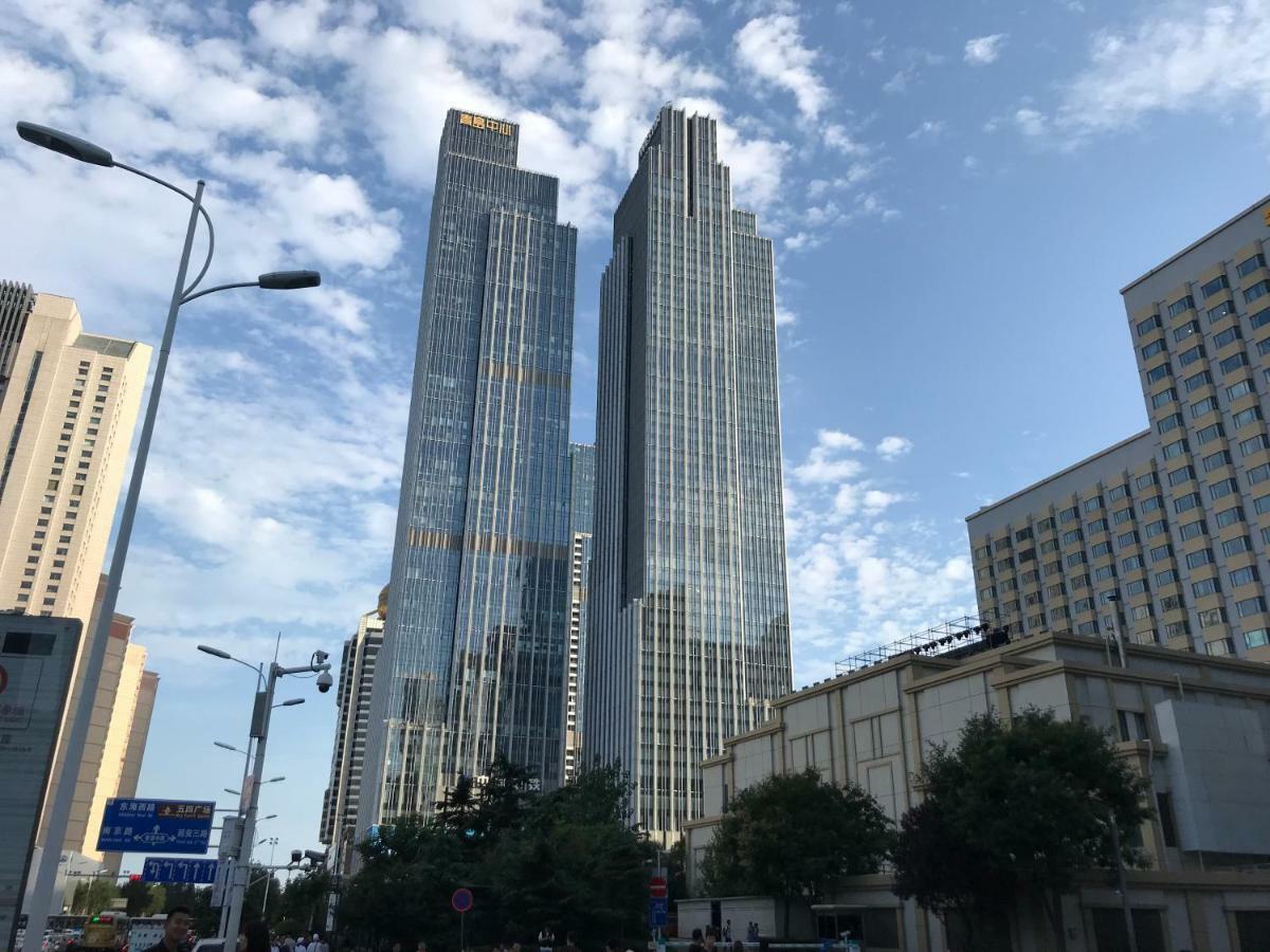 Qingdao Elegant Central Apartment Екстер'єр фото