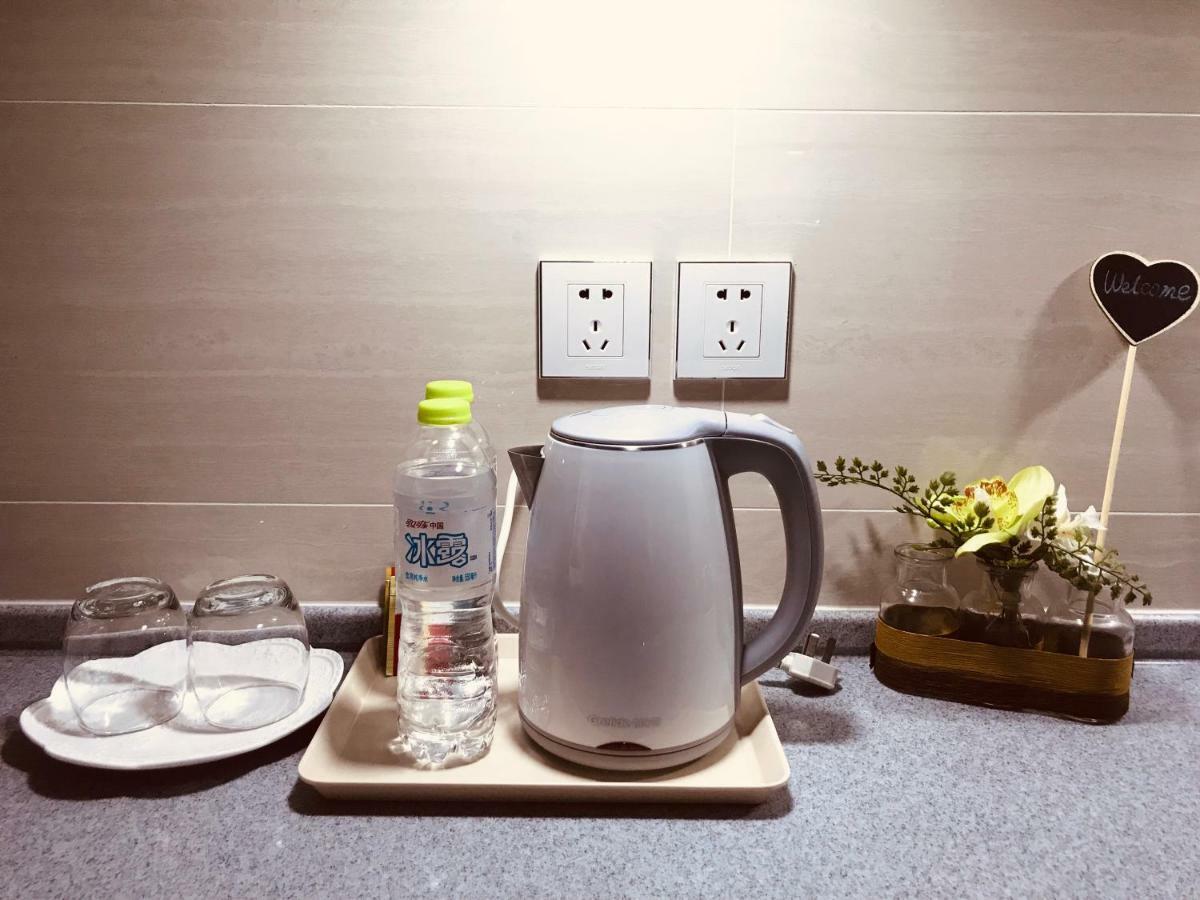 Qingdao Elegant Central Apartment Екстер'єр фото